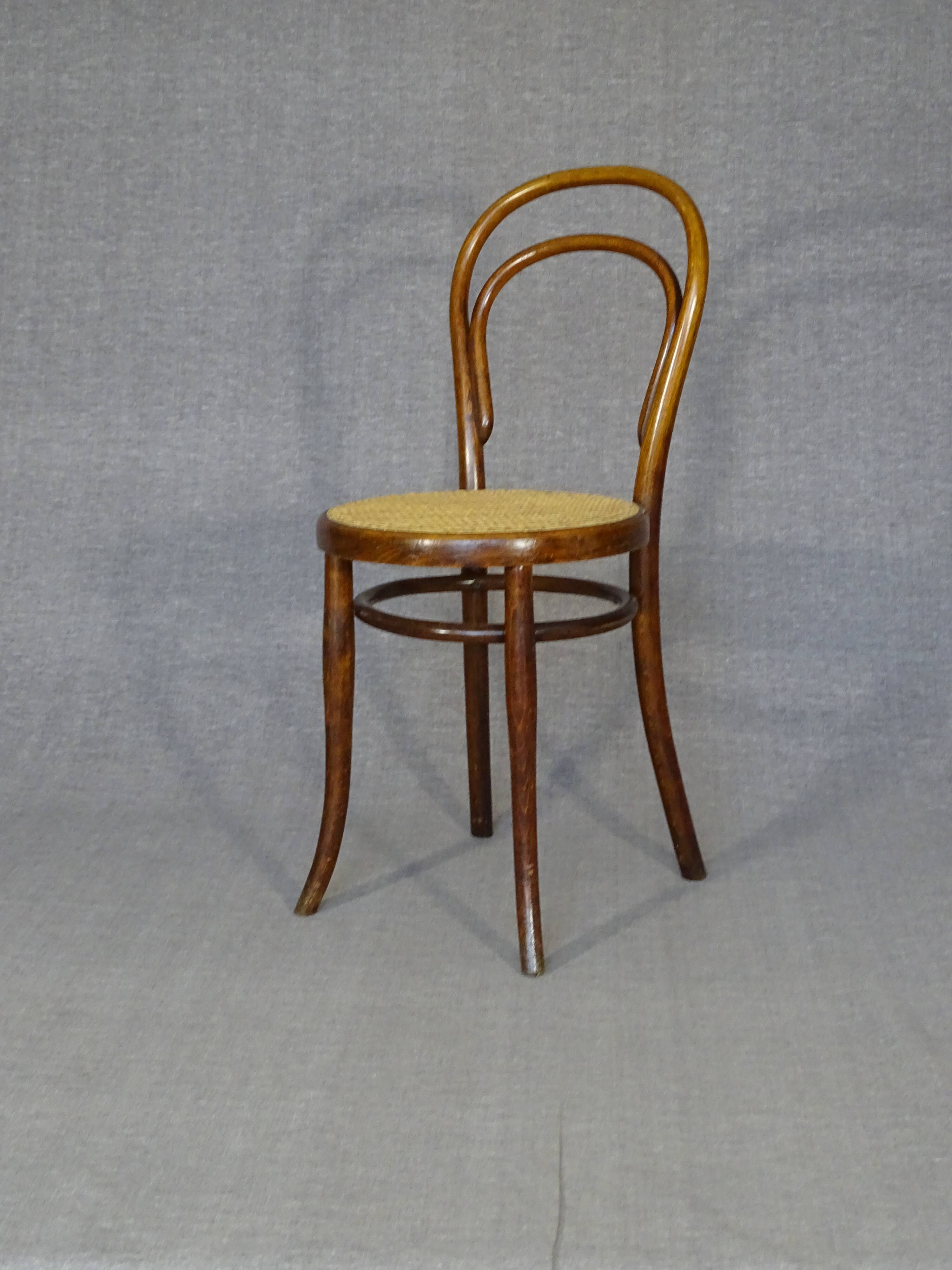 4 mismatched bistro chairs in wood and cane, Thonet, Horgen circa 1910