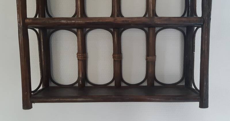 Rattan wall shelf from the 70s.
