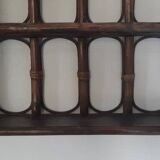 Rattan wall shelf from the 70s.