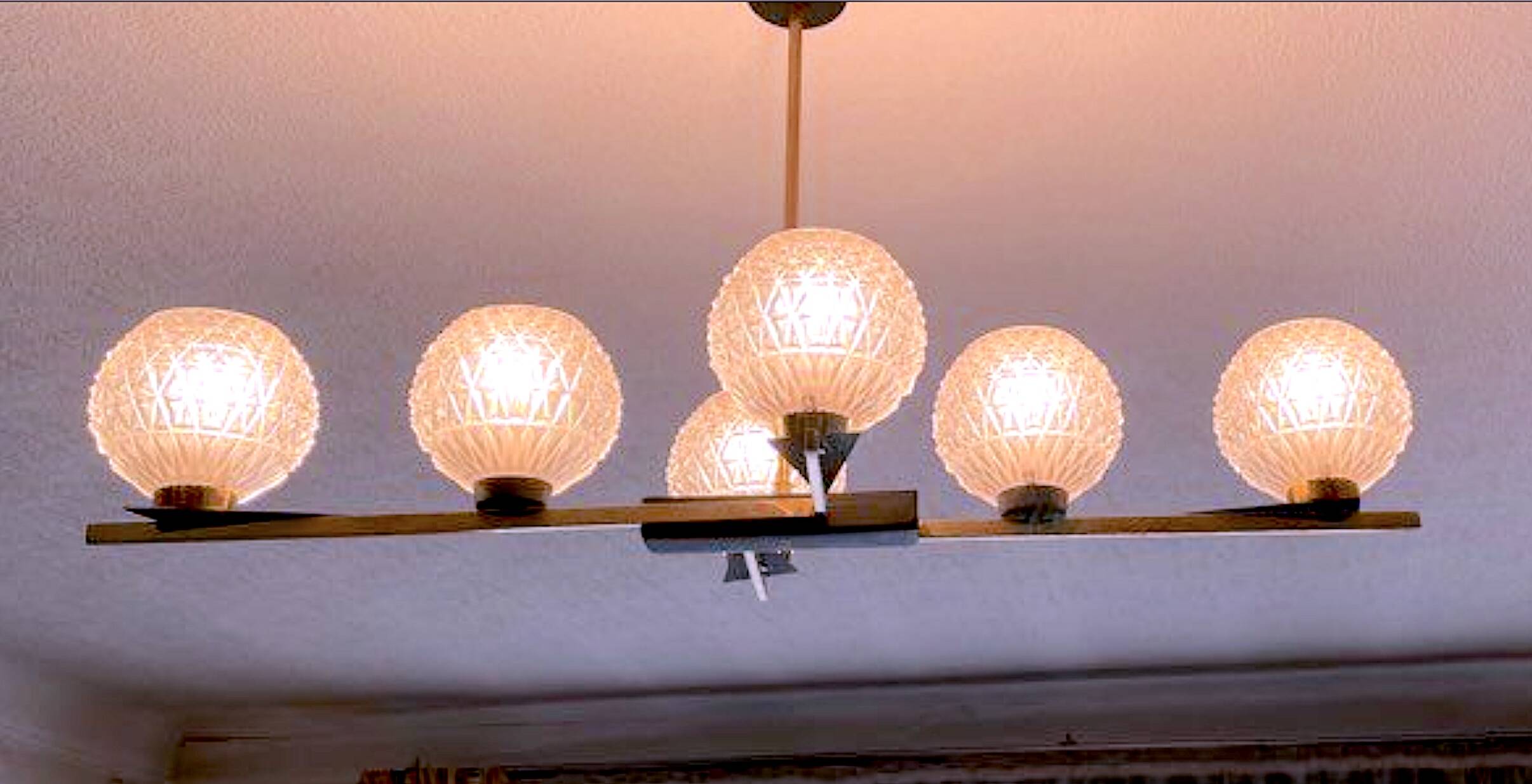 Maison Arlus Pair of brass and black wall sconces, France Mid-Century