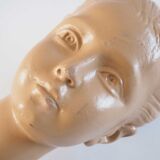 Bust of a young girl in plaster