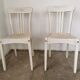 Set of 6 mismatched white chairs