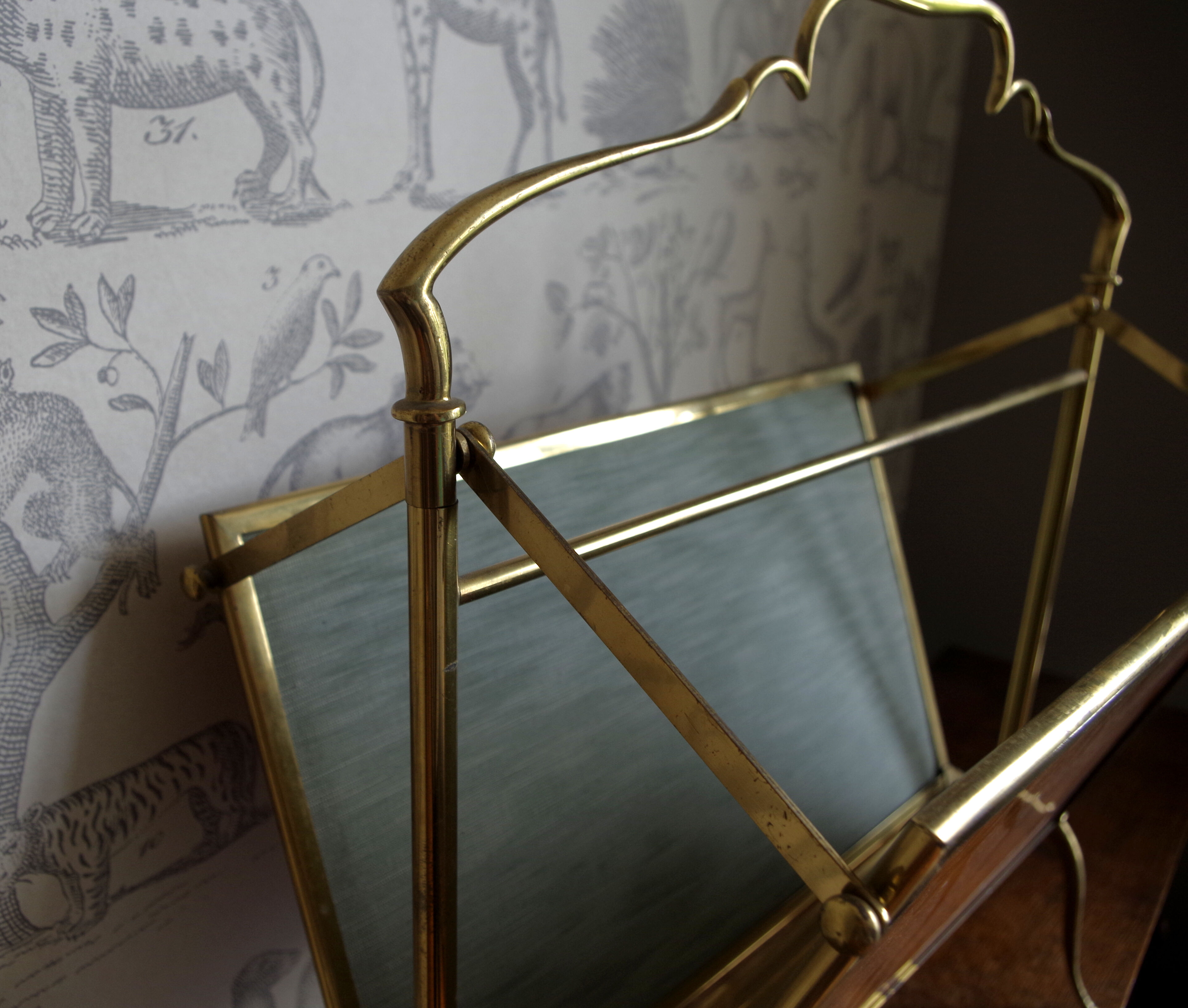 Brass folding magazine rack