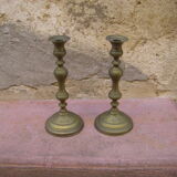 Pair of candle holders with oriental decoration