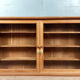 Narrow showcase in chestnut and exotic wood of the twentieth circa 1900