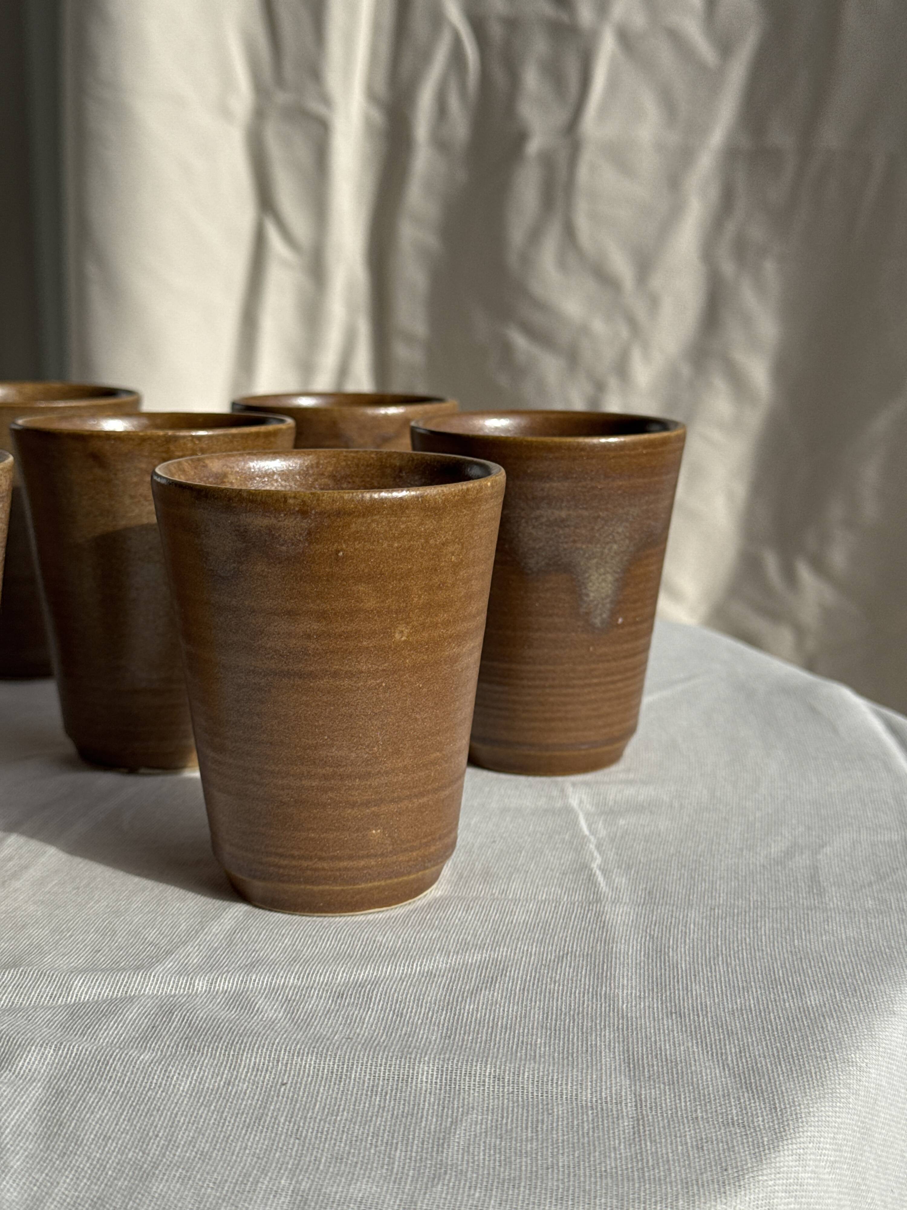 Set of 10 small stoneware mugs from Digoin.