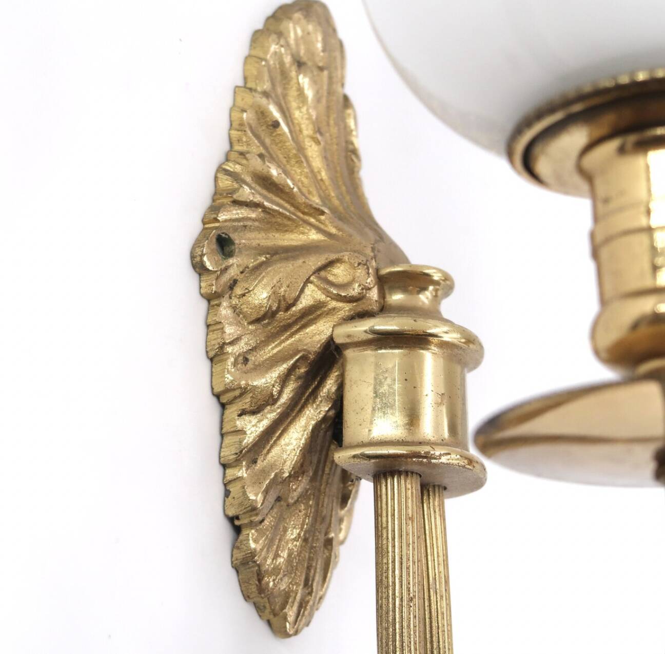 Pair of brass and opaque glass wall lights, 1950s