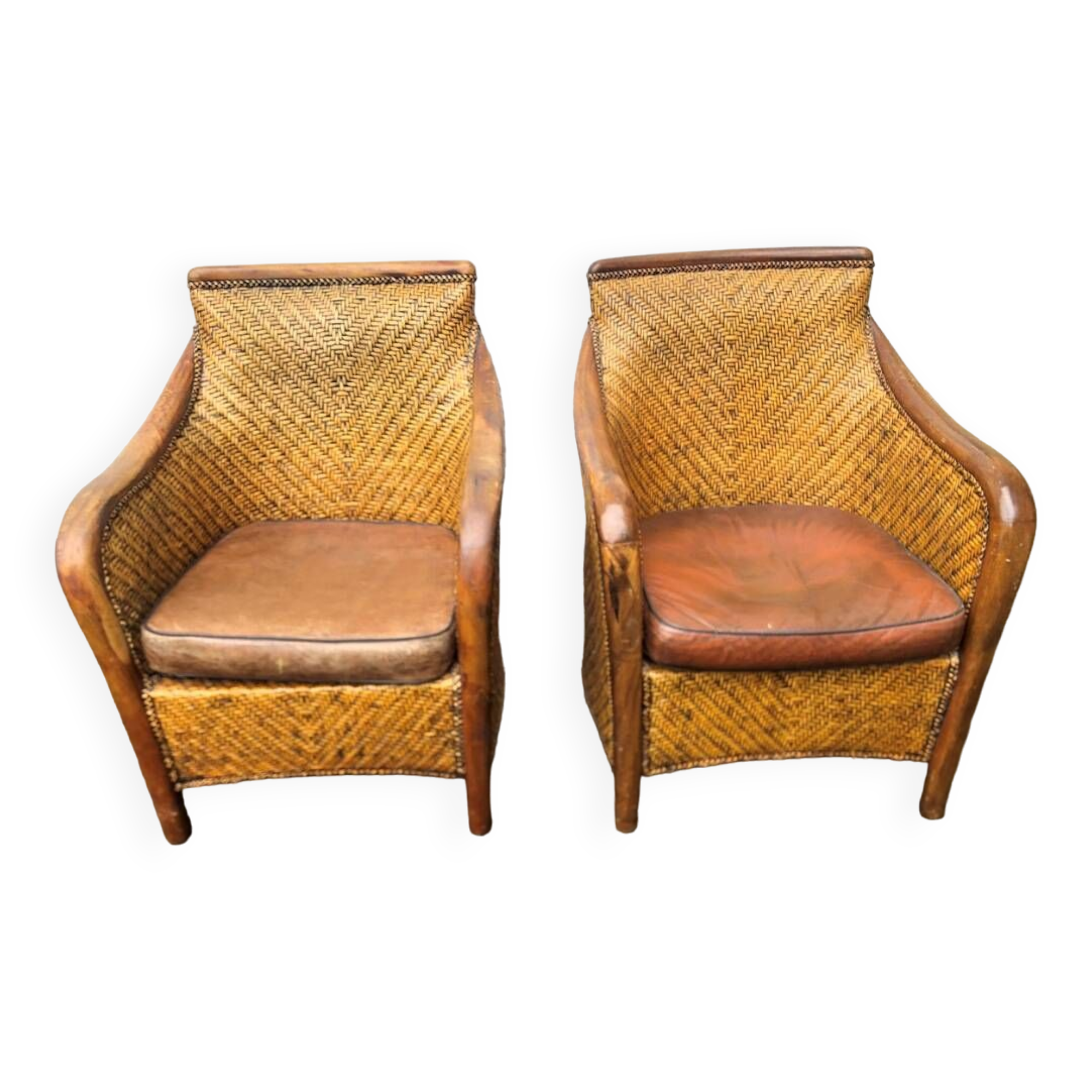 2 colonial armchairs in wood, rattan and leather, 1950s