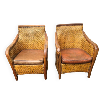 2 fauteuils coloniaux en bois, rotin et cuir, années 50