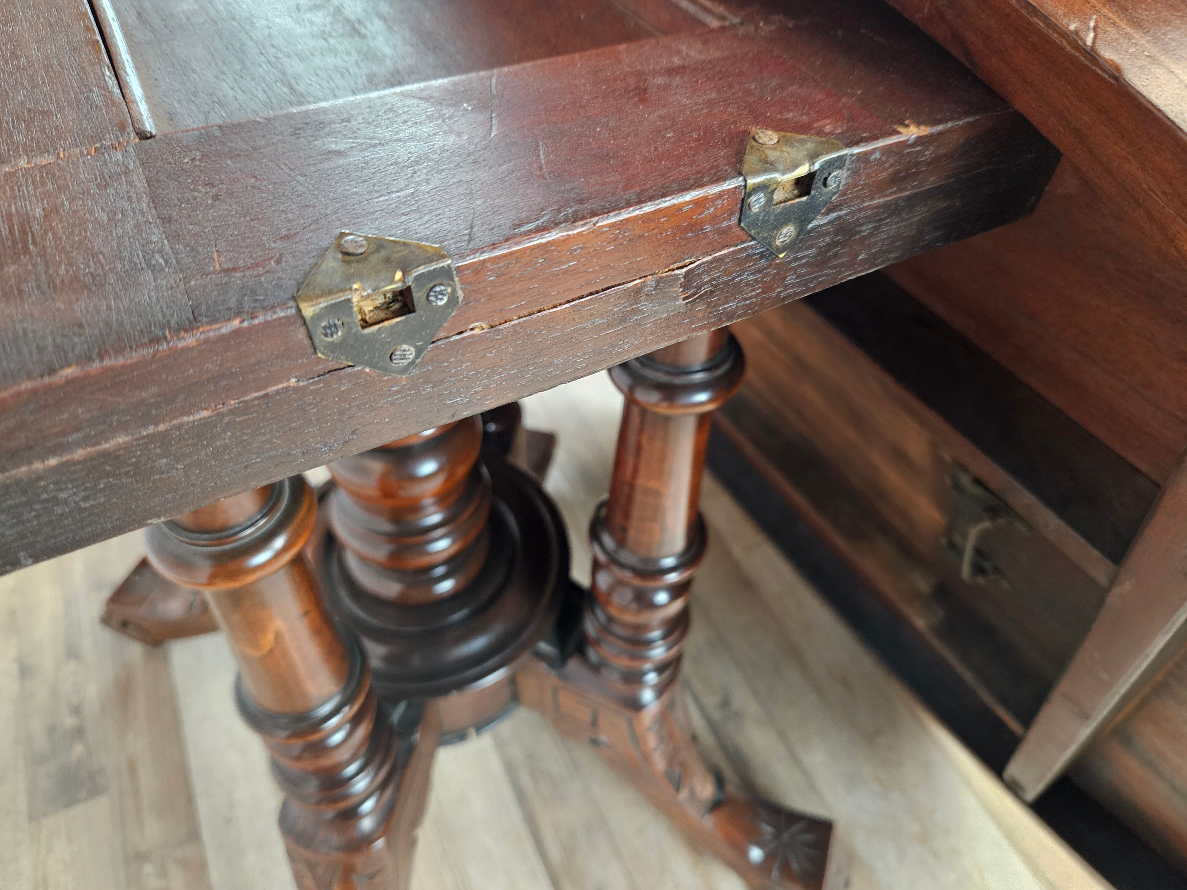 Coffee table in walnut with maple inlays and wheels