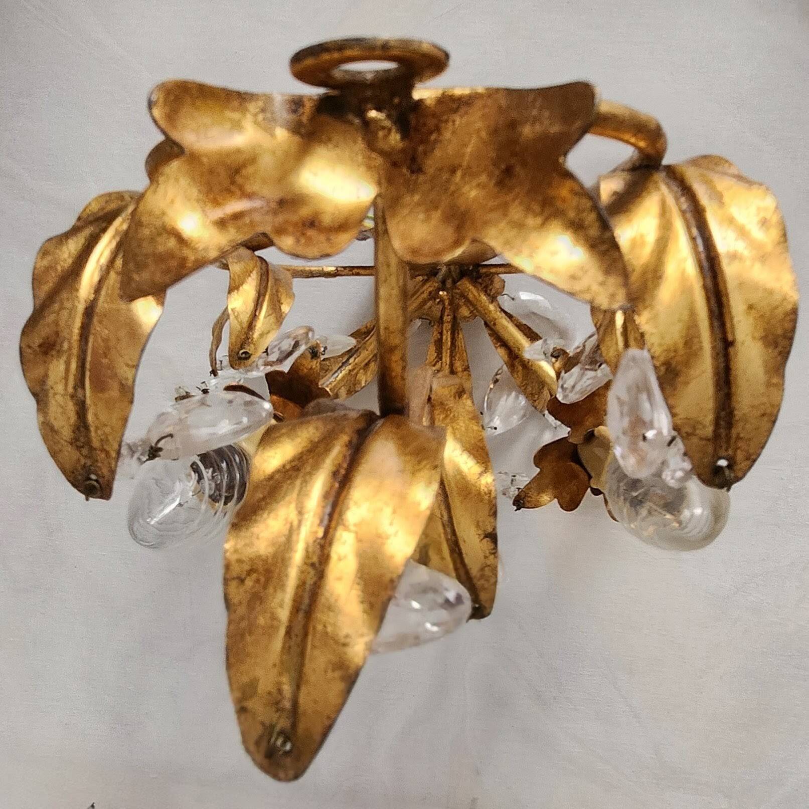 Hand-forged wall lamp gilded with gold leaf and crystals, Italy