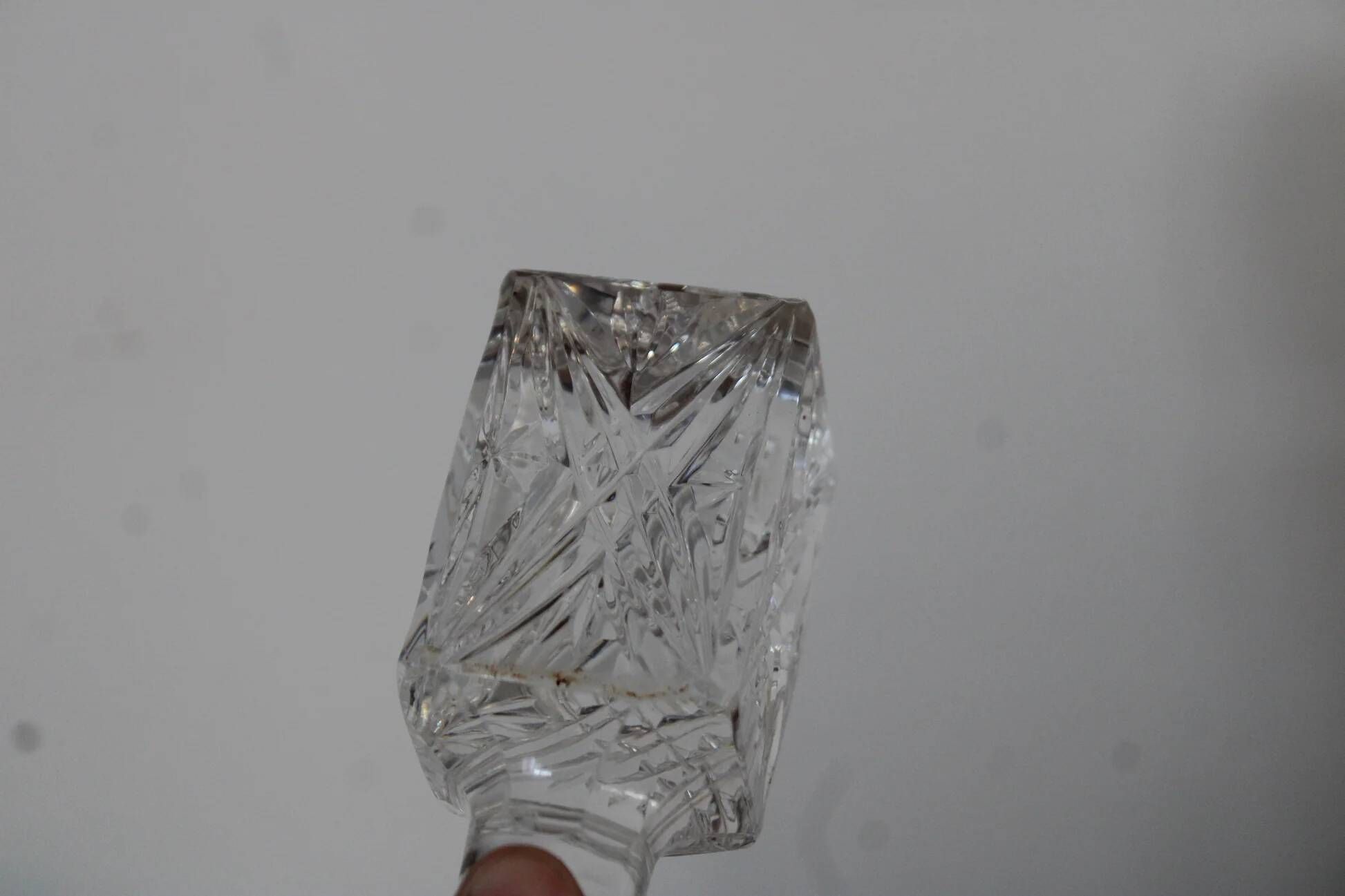Antique cut glass carafe, probably crystal – Geometric patterns and matching stopper.