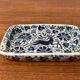 Vintage handmade blue ceramic ashtray with deer and flower ornament from Rodos Ceramics.