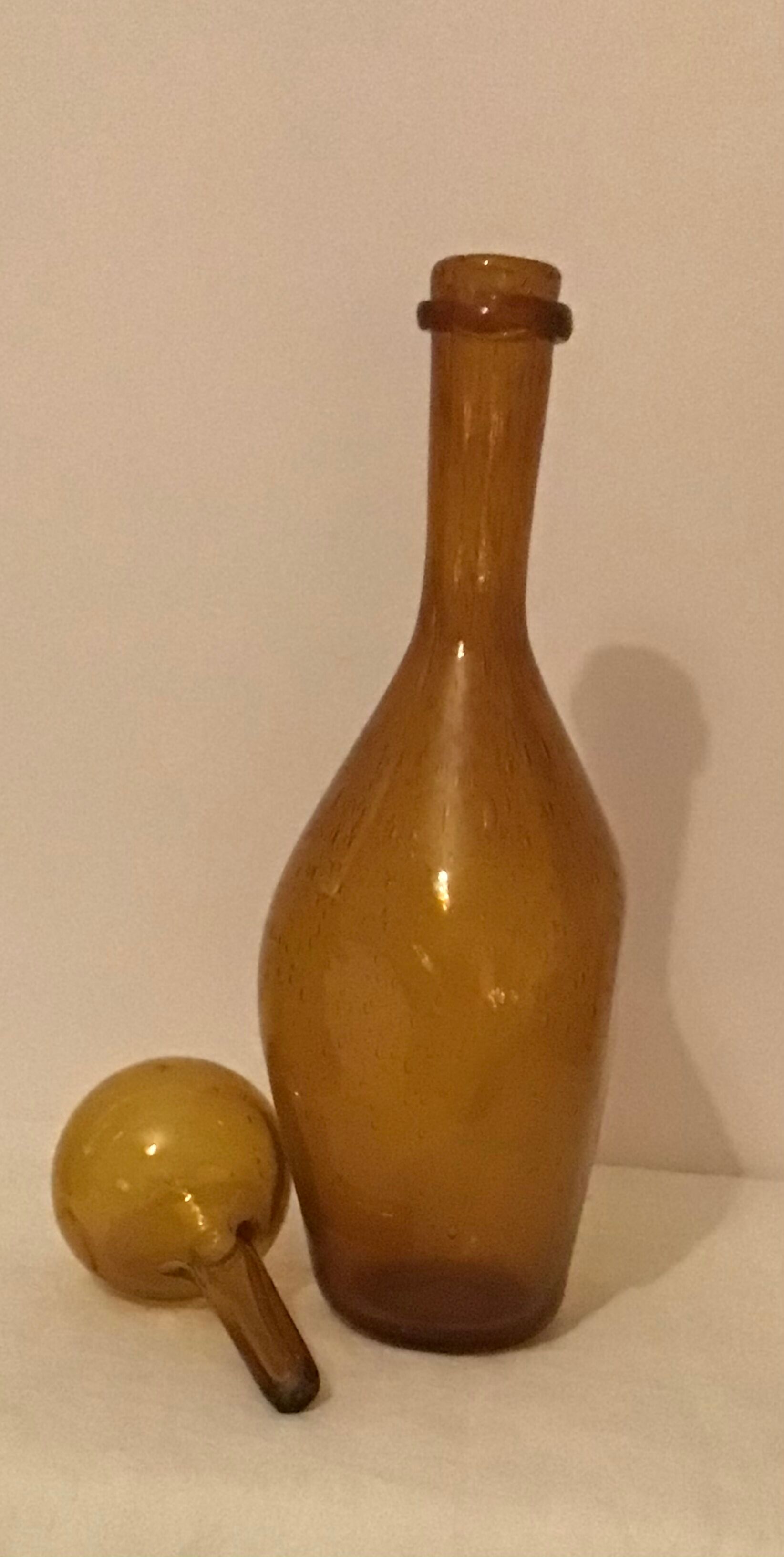 Carafe bubbled glass amber color signed Biot, vintage