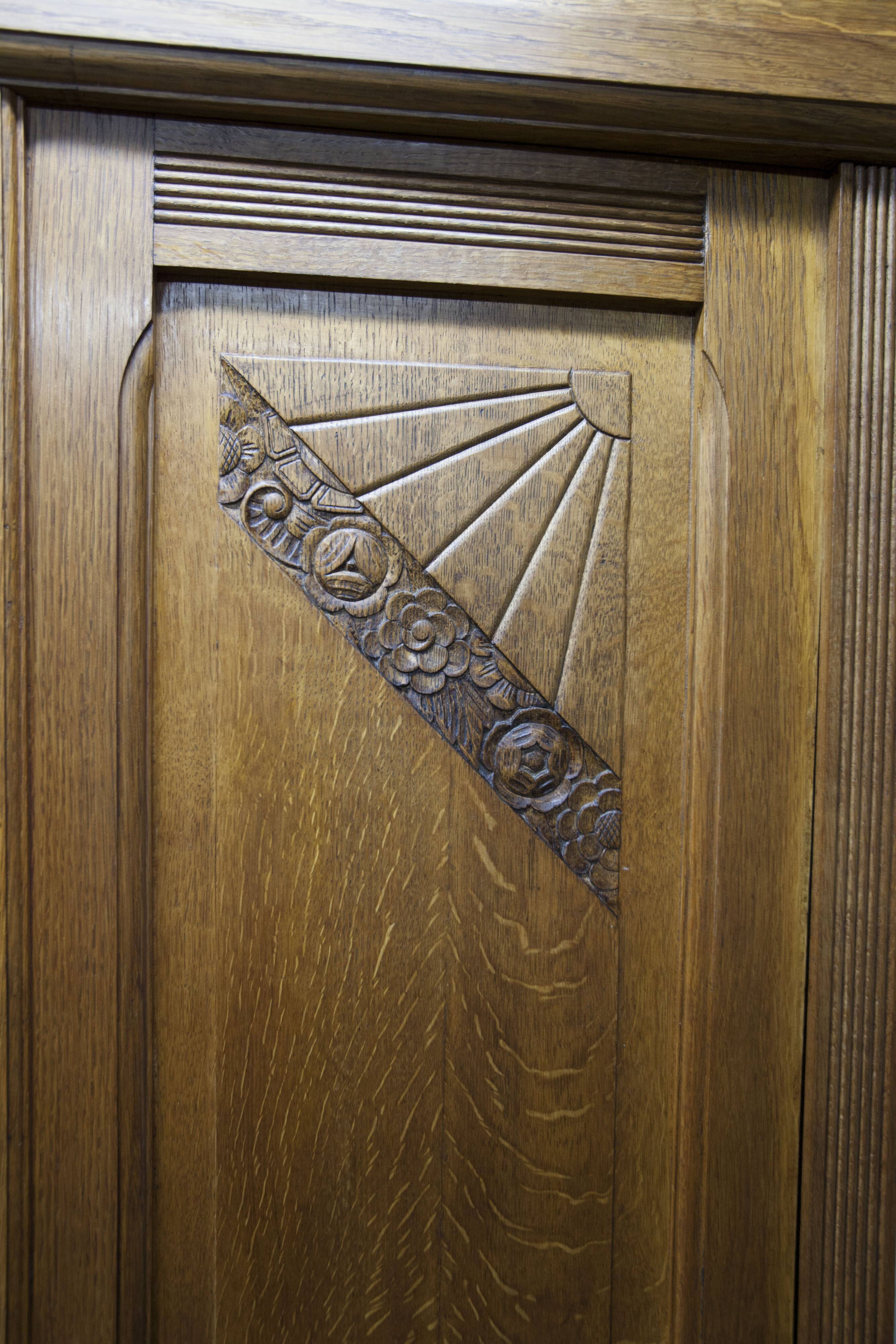 Art Deco carved oak wardrobe - Flemish workshop circa 1930