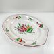 Oval flat dish with flat ends, Réverbère model by KG Lunéville, rose pattern.