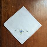 Square of hand-embroidered fabric forget-me-not