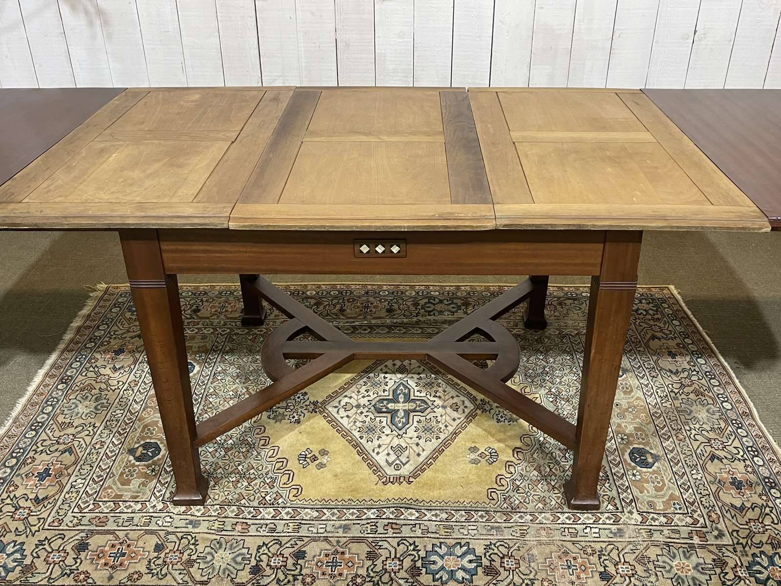 Art Nouveau dining table in mahogany in the style of Gustave Serrurier-Bovy.
