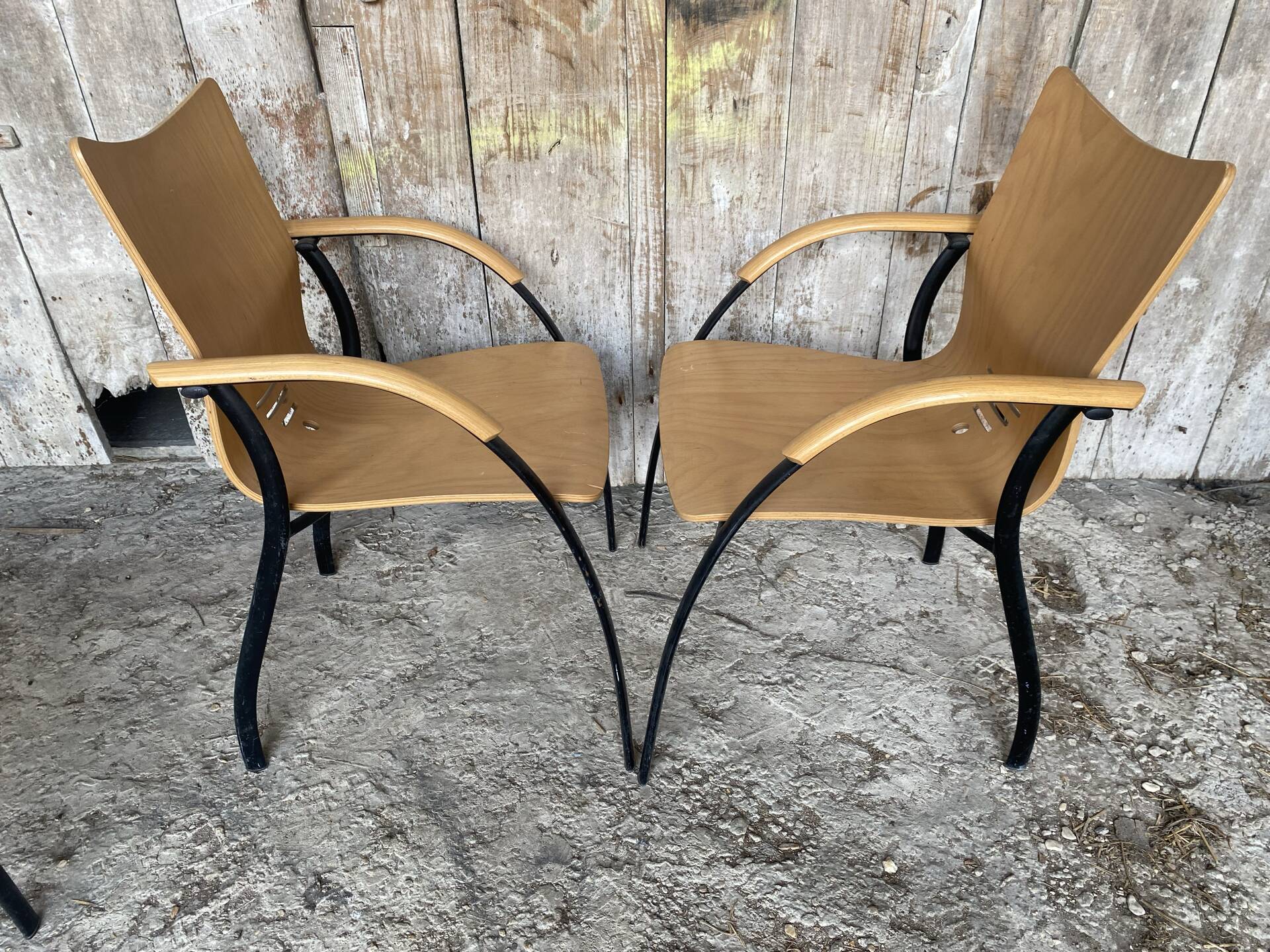 Pair of Vintage RONÉO Armchairs with Black Metal Legs + Curved Wooden Shell