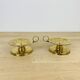 Pair of gilded brass cellar rat candlesticks