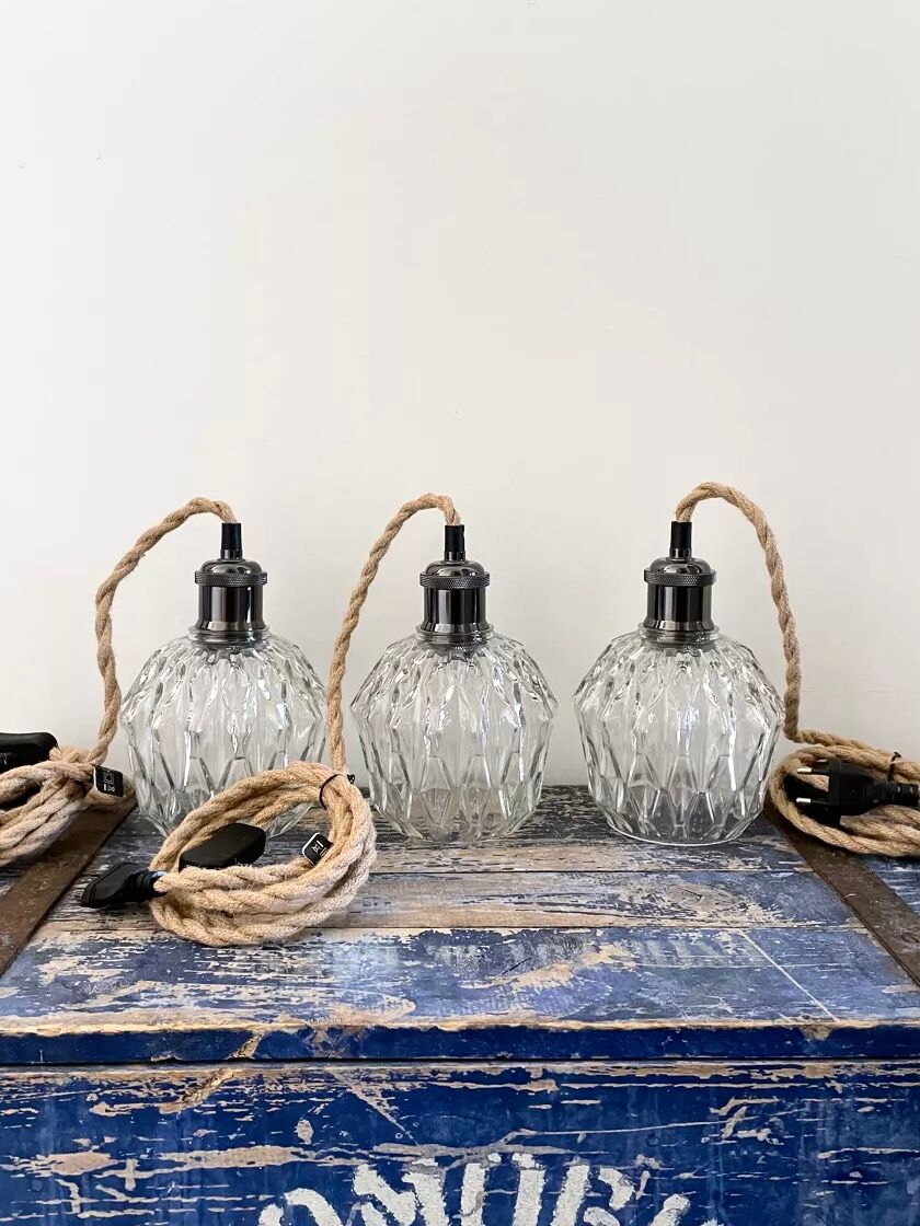 Set of three vintage electric chiseled glass walking lamps
