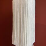 Beige marble stucco base, Houles white ecru fringed lampshade.