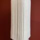 Beige marble stucco base, Houles white ecru fringed lampshade.
