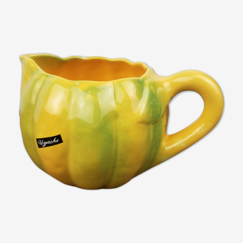 Pitcher in yellow melon slurry