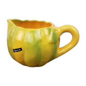 Pitcher in yellow melon slurry