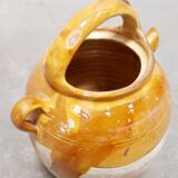 Old gargoulette pot in glazed terracotta
