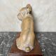 Terracotta dog signed R. Pollin