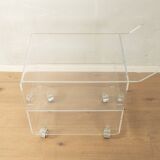 Wonderful side table from the 1960s, high-quality frame and shelf made of transparent acrylic with chrome-plated castors