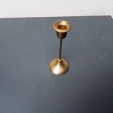 A brass candle holder