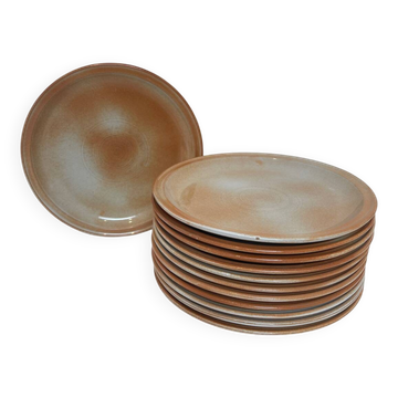 12 assiettes plates grès, 1970