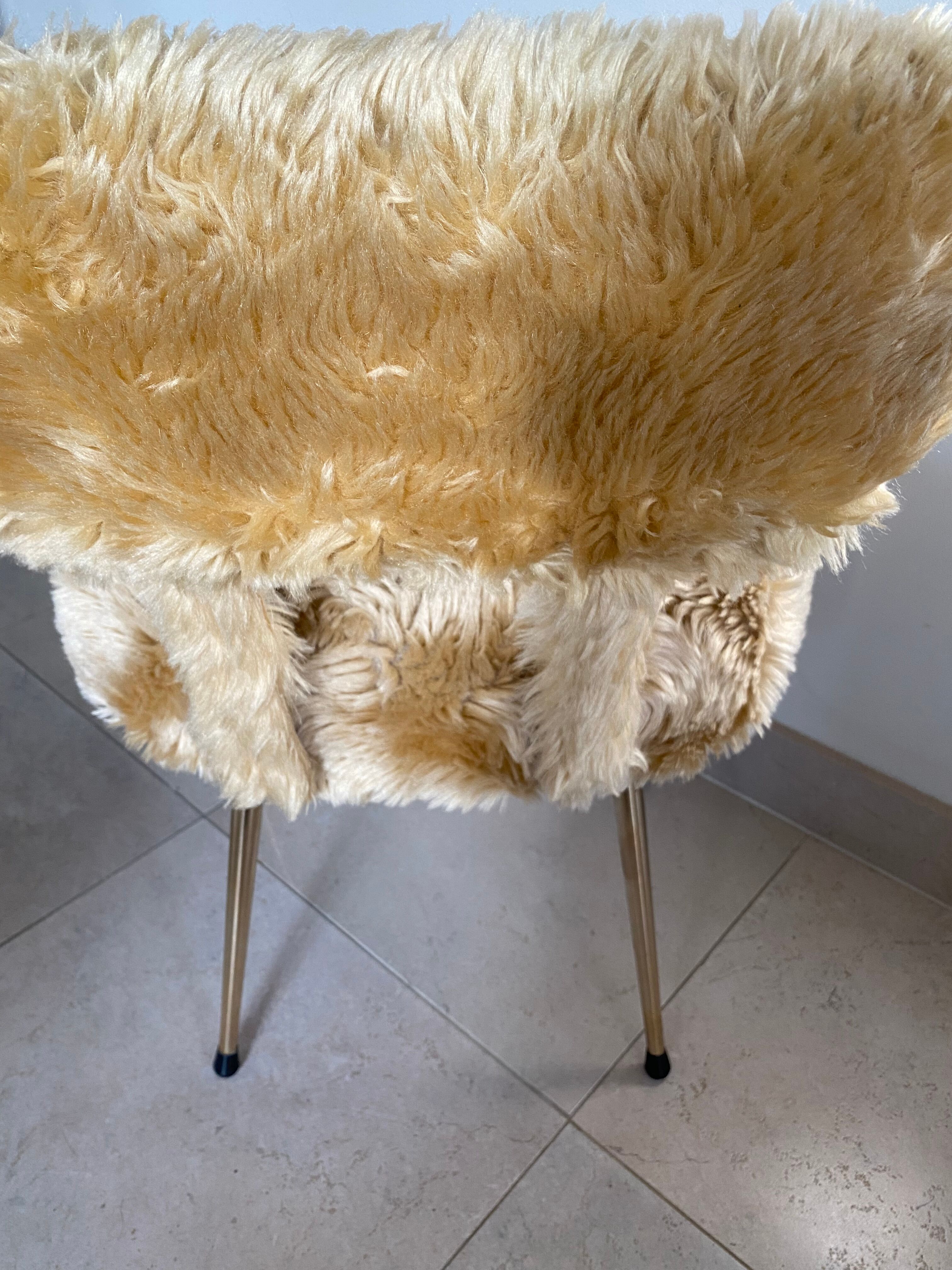 2 Pelfran chairs, moumoute chairs, golden compass legs, vintage from the 60s.