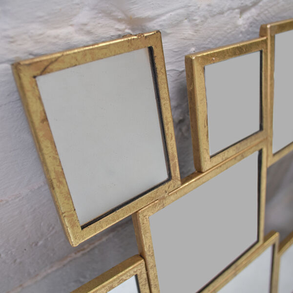 Miroir en métal doré à la feuille 106x63cm