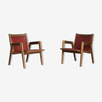 Pair of red Jacques Hauville armchairs 1950