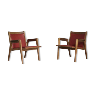 Pair of red Jacques Hauville armchairs 1950