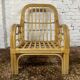 Fauteuil chauffeuse vintage en rotin des années 70