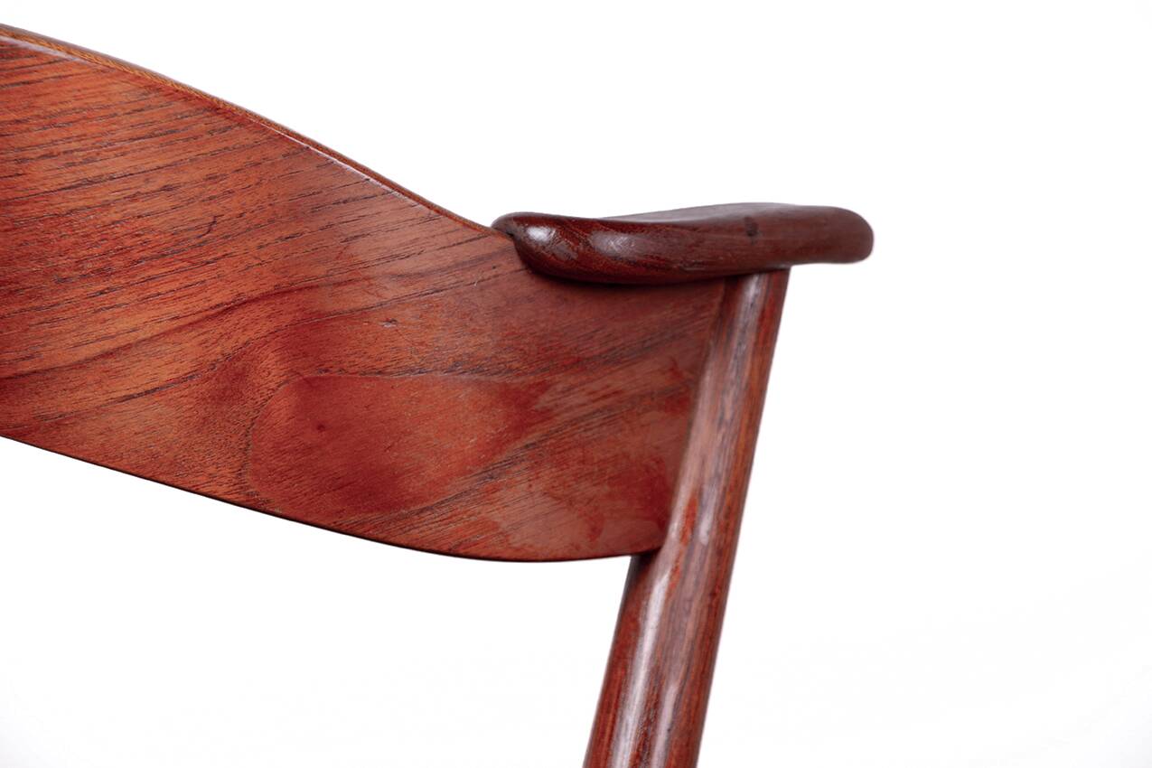 Danish armchair in teak and Skai, by Henning Kjaernulf for Korup Stolefabr.