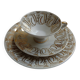 Solitaire tea cup, saucer, and dessert plate in white and gold.
