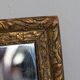 Antique mirror in gilded wood