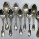 Set of 9 silver-plated soup spoons with a bi-lobed filet pattern.