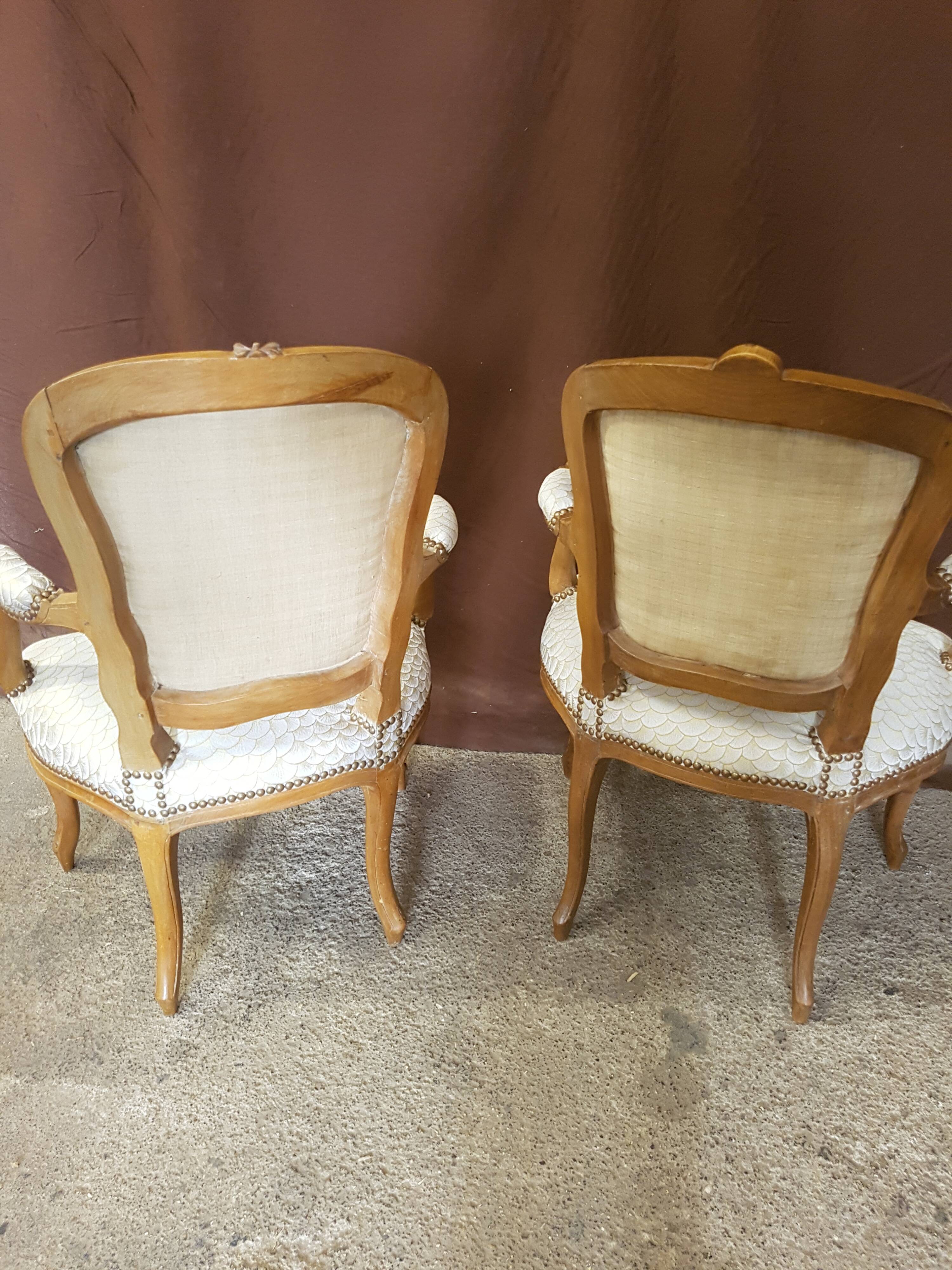 Pair of Louis XV-era convertible armchairs