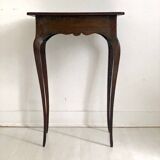 Side table with curved legs