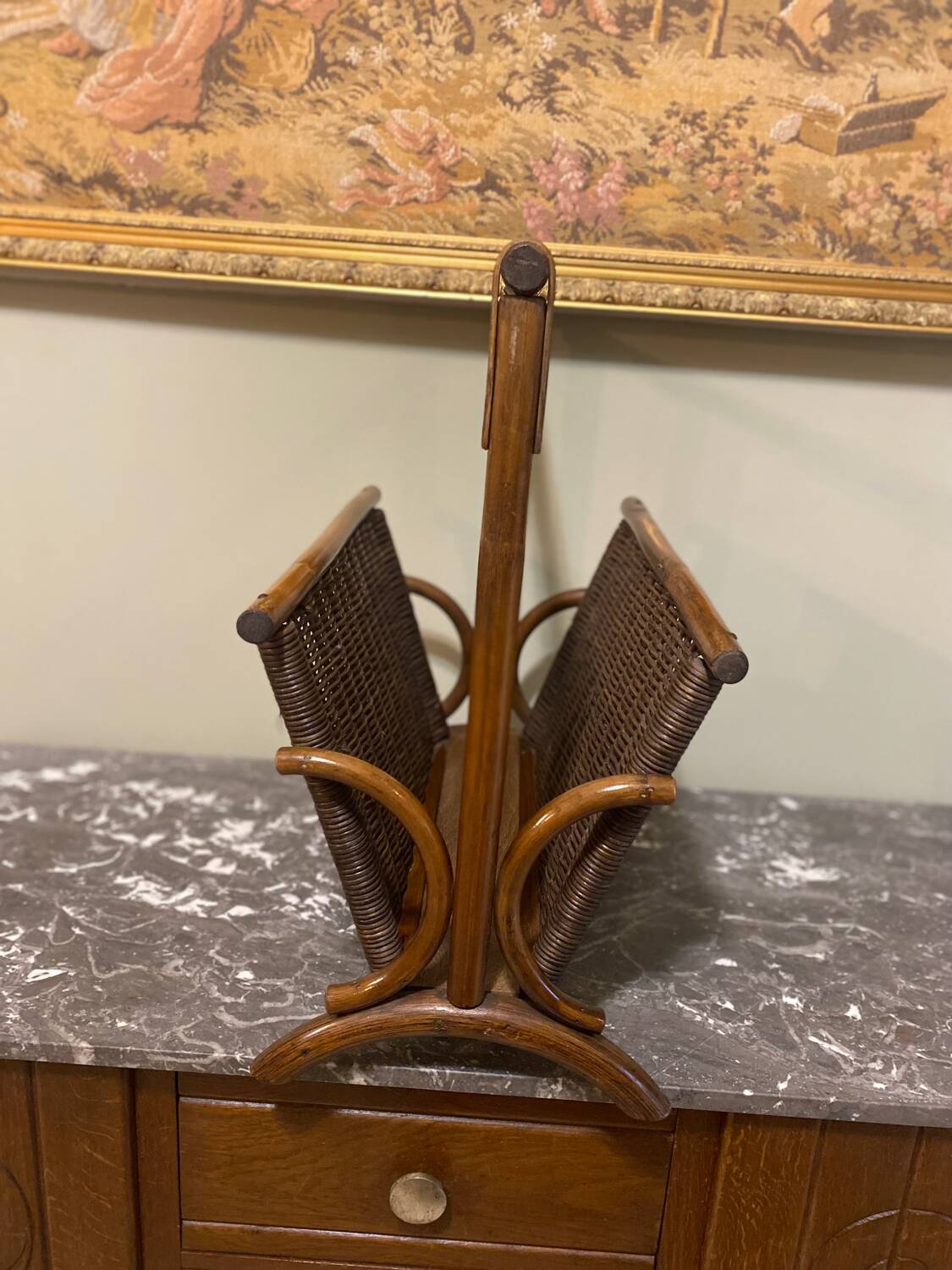 Wicker and brown wood magazine rack