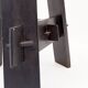 Vintage black-stained wooden tripod stool with mortise joints.