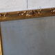 Miroir en bois doré biseauté