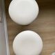 Pair of vintage Z low stools with chrome metal base and white skai seat. H: 49 cm 80s