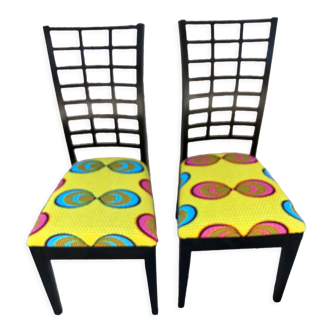 Pair of chairs upholstered with wax fabric